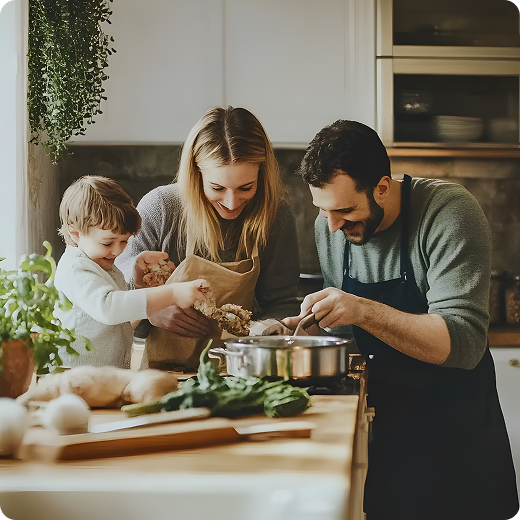 Family cooking together in kitchen